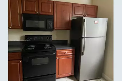 10105 W Sunrise Blvd #201, Plantation, FL 33322 - Photo 2