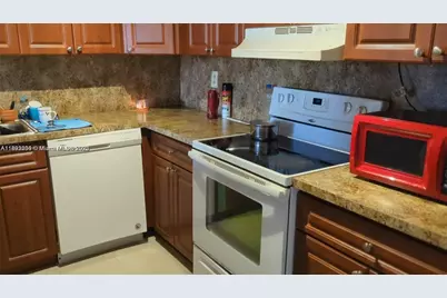 6960 Miami Gardens Dr #2-420, Hialeah, FL 33015 - Photo 2