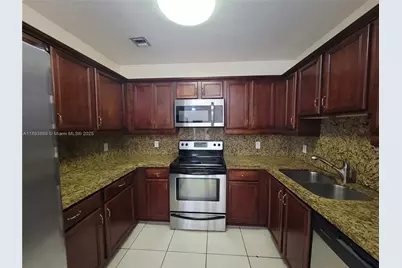 5271 SW 8th St #411, Miami, FL 33134 - Photo 1