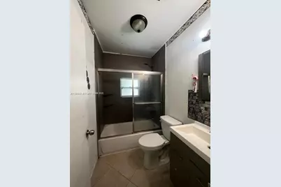 1036 NW 64th St, Miami, FL 33150 - Photo 6