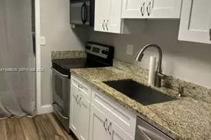 303 Racquet Club Rd, Weston, FL 33326 - Photo 1