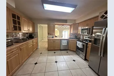 3730 NW Alcantara Ave #69-F, Doral, FL 33178 - Photo 8