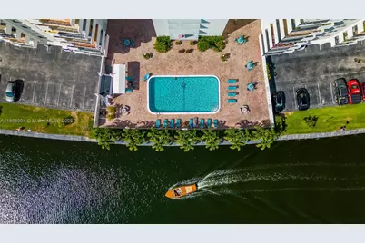 401 Golden Isles Dr #304, Hallandale Beach, FL 33009 - Photo 4