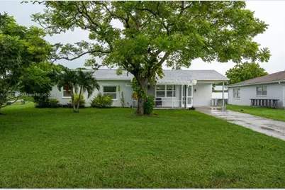 121 E 3rd Street, Lehigh Acres, FL 33936 - Photo 1