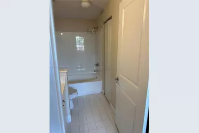 5840 W Sample Rd #306, Coral Springs, FL 33067 - Photo 8