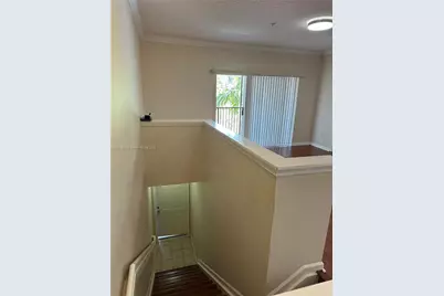 5840 W Sample Rd #306, Coral Springs, FL 33067 - Photo 14