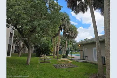 8735 Ramblewood Dr #413, Coral Springs, FL 33071 - Photo 30