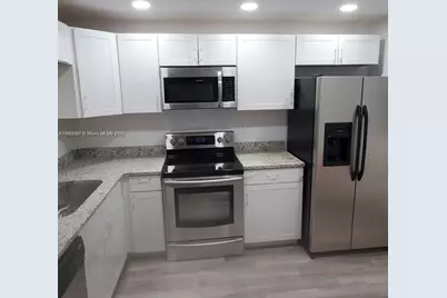 9000 NW 28th Dr #1-102, Coral Springs, FL 33065 - Photo 14