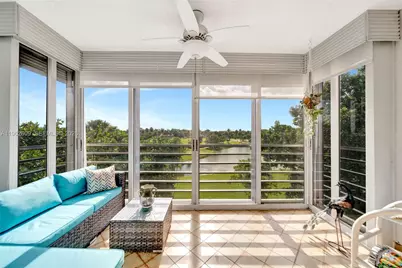 3980 Oaks Clubhouse Dr #409, Pompano Beach, FL 33069 - Photo 2