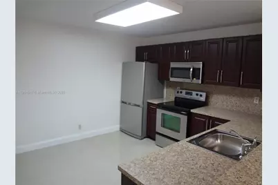 10125 W Sunrise Blvd #104, Plantation, FL 33322 - Photo 1