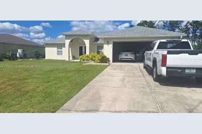 743 Grant Blvd, Other City - In The State Of Florida, FL 33974 - Photo 1