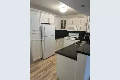 5530 NW 61st St #304, Coconut Creek, FL 33073 - Photo 1