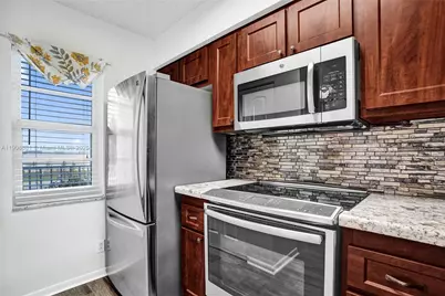 2220 N Cypress Bend Dr #310, Pompano Beach, FL 33069 - Photo 12
