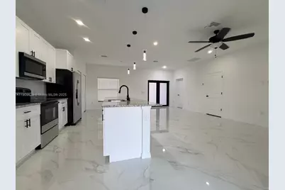 2706 72nd St W, Lehigh Acres, FL 33971 - Photo 6