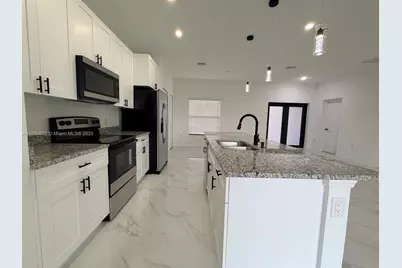 2706 72nd St W, Lehigh Acres, FL 33971 - Photo 4