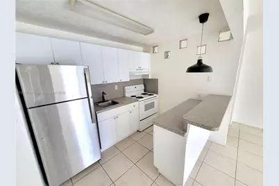 4275 NW South Tamiami Canal Dr #2-103, Miami, FL 33126 - Photo 8