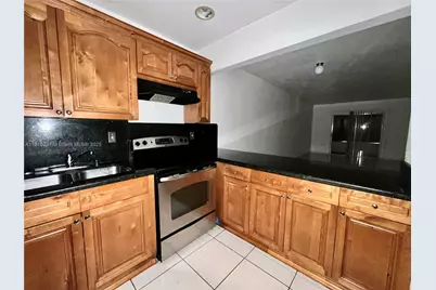 6095 W 19th Ave #412, Hialeah, FL 33012 - Photo 4