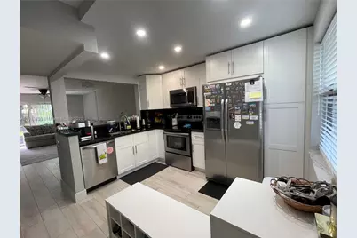 1290 S Military Trl #411, Deerfield Beach, FL 33442 - Photo 2