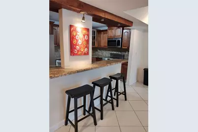9735 NW 52nd St #411, Doral, FL 33178 - Photo 2