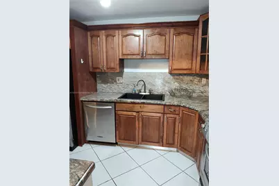 9735 NW 52nd St #411, Doral, FL 33178 - Photo 1