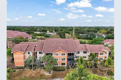 8901 Wiles Rd #103, Coral Springs, FL 33067 - Photo 1