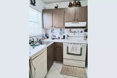 8590 Sunrise Lakes Blvd #310, Sunrise, FL 33322 - Photo 1