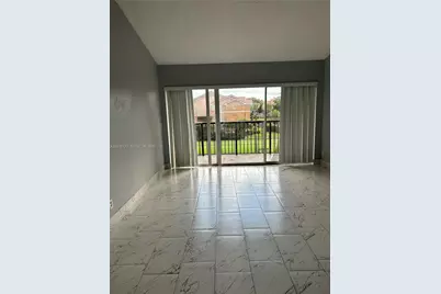 8801 Wiles Rd #306, Coral Springs, FL 33067 - Photo 4
