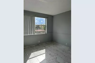 8801 Wiles Rd #306, Coral Springs, FL 33067 - Photo 6