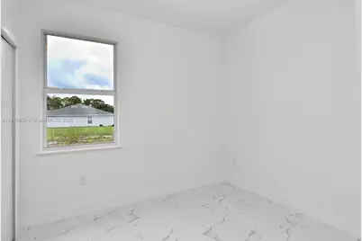 1905 Charles Ave N, Lehigh Acres, FL 33971 - Photo 14