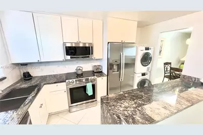 4380 27th Ct SW # 1-104, Naples, FL 34116 - Photo 1