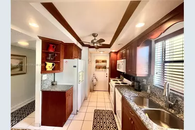 2309 S Cypress Bend Dr #311, Pompano Beach, FL 33069 - Photo 8