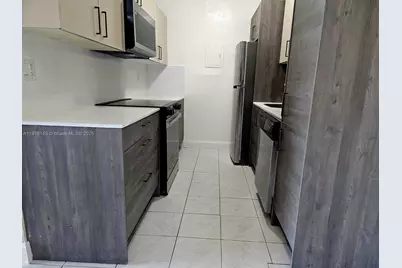 5501 NW 7th St #E302, Miami, FL 33126 - Photo 28