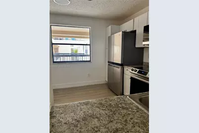 605 Ives Dairy Rd #306-7, Miami, FL 33179 - Photo 6