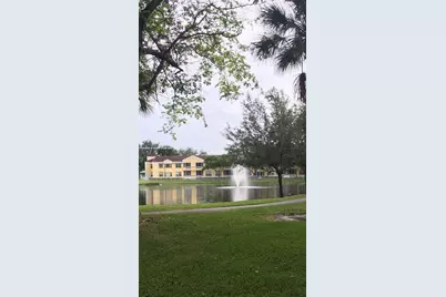 8592 W Sunrise Blvd #111, Plantation, FL 33322 - Photo 1