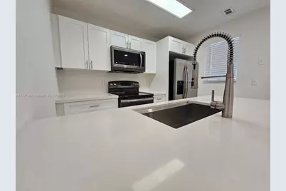 6580 W 27th Ct #58-21, Hialeah, FL 33016 - Photo 2