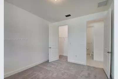 1366 Harvester Xing, Loxahatchee, FL 33470 - Photo 18