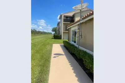 1089 N Benoist Farms Rd #107, West Palm Beach, FL 33411 - Photo 2
