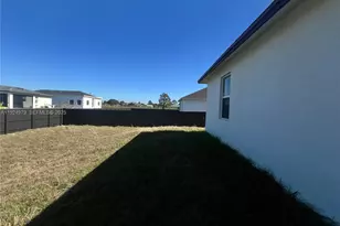 2812 W 54th St, Lehigh Acres, FL 33971 - Photo 4