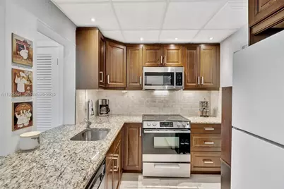 300 Golden Isles Dr #204, Hallandale Beach, FL 33009 - Photo 4