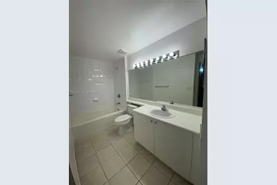 8000 N Nob Hill Rd #101, Tamarac, FL 33321 - Photo 12
