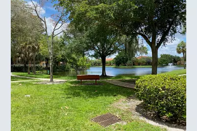 8000 N Nob Hill Rd #101, Tamarac, FL 33321 - Photo 14