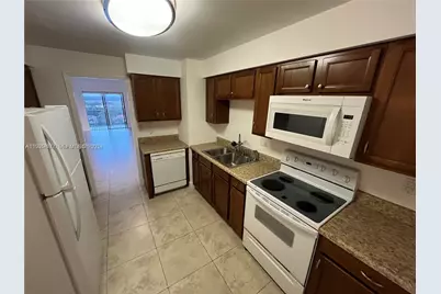 3575 Broken Woods Dr #1002, Coral Springs, FL 33065 - Photo 6