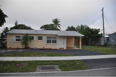 571 NE 61st St, Oakland Park, FL 33334 - Photo 1