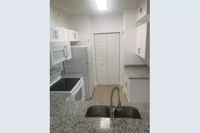 8070 N Nob Hill Rd #108, Tamarac, FL 33321 - Photo 6