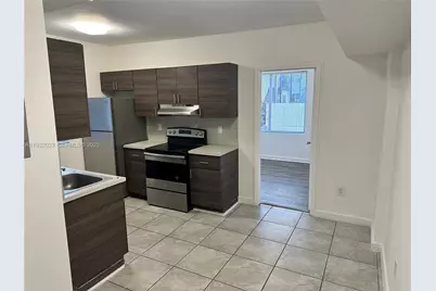 1129 NW 3rd St #101, Miami, FL 33128 - Photo 2