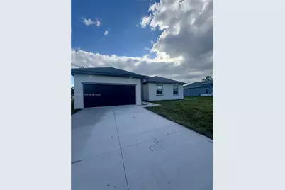 748 748 Chestnut St E, Lehigh Acres, FL 33974 - Photo 1