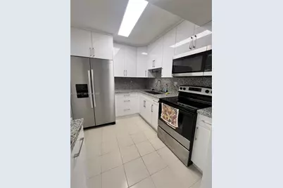 4717 NW 7th St #601-10, Miami, FL 33126 - Photo 1