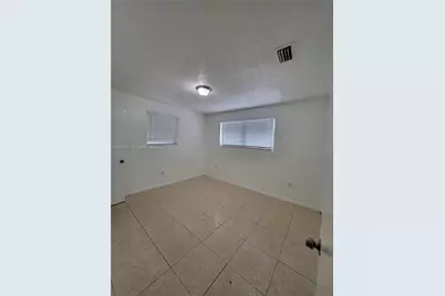 1404 NW 60th St #1404, Miami, FL 33142 - Photo 12