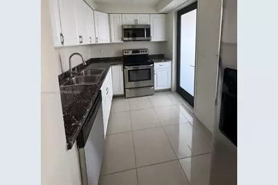 301 Golden Isles Dr #112, Hallandale Beach, FL 33009 - Photo 12