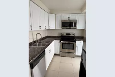 301 Golden Isles Dr #112, Hallandale Beach, FL 33009 - Photo 1